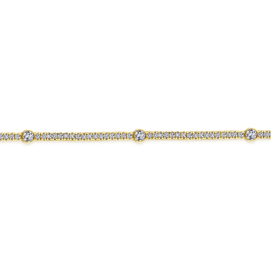 14K Yellow Gold Diamond Tennis Bracelet with Bezel Set Diamond Stations angle 2 14K Yellow Gold Diamond Tennis Bracelet with Bezel Set Diamond Stations angle 2