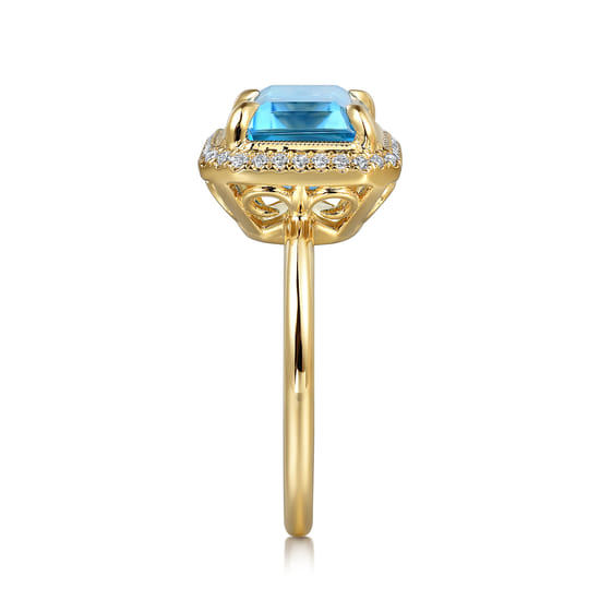 14K Yellow Gold Diamond and Blue Topaz Emerald Cut Ladies Ring With Flower Pattern Gallery angle 4 14K Yellow Gold Diamond and Blue Topaz Emerald Cut Ladies Ring With Flower Pattern Gallery angle 4