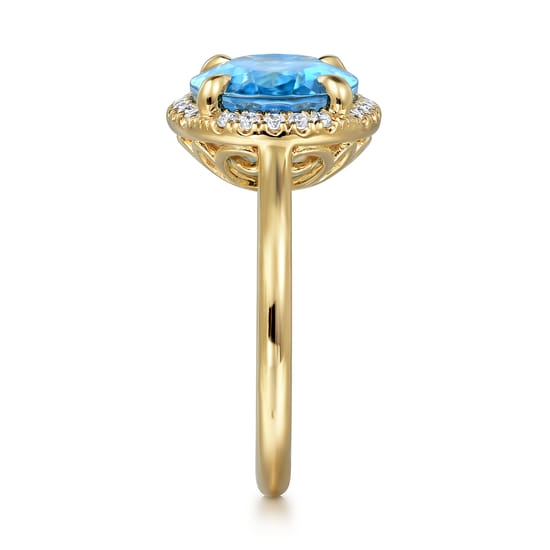 14K Yellow Gold Diamond and Oval Shape Blue Topaz Ladies Ring With Flower Pattern Gallery angle 4