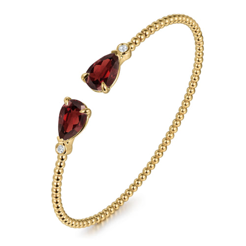 14K Yellow Gold Diamond and Pear Shape Garnet Bujukan Bangle 14K Yellow Gold Diamond and Pear Shape Garnet Bujukan Bangle
