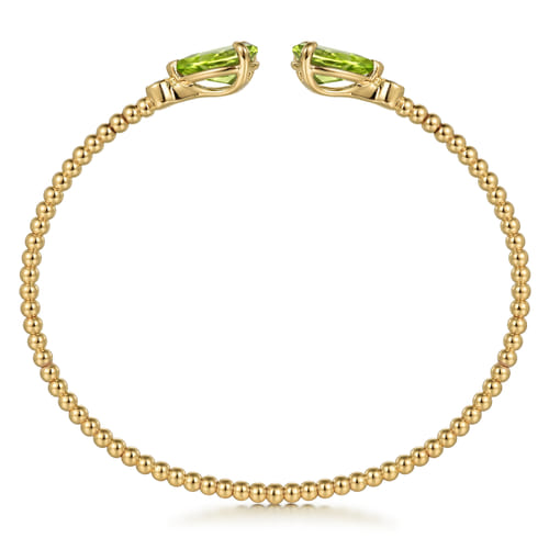 14K Yellow Gold Diamond and Pear Shape Peridot Bujukan Bangle 14K Yellow Gold Diamond and Pear Shape Peridot Bujukan Bangle