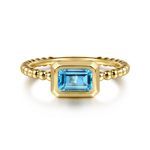 14K Yellow Gold Emerald Cut Blue Topaz Bujukan Promise Ring 14K Yellow Gold Emerald Cut Blue Topaz Bujukan Promise Ring