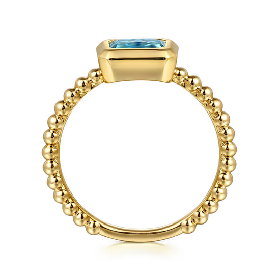 14K Yellow Gold Emerald Cut Blue Topaz Bujukan Promise Ring angle 2 14K Yellow Gold Emerald Cut Blue Topaz Bujukan Promise Ring angle 2