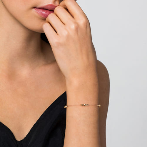 14K Yellow Gold Graduating Bead Stations Bracelet