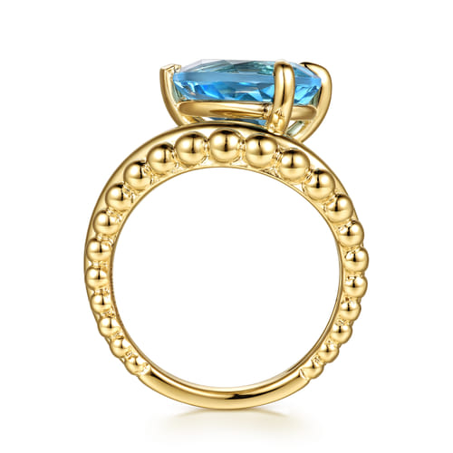 14K Yellow Gold Graduating Bujukan Pear Blue Topaz Curved Ring