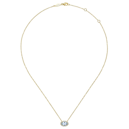 14K Yellow Gold Oval Aquamarine and Diamond Halo Pendant Necklace