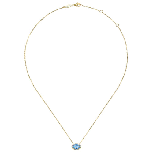 14K Yellow Gold Oval Blue Topaz and Diamond Halo Pendant Necklace