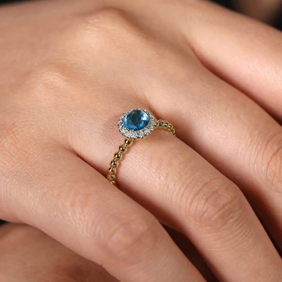 14K Yellow Gold Round Blue Topaz and Diamond Halo Bezel Set Bujukan Promise Ring  angle 5