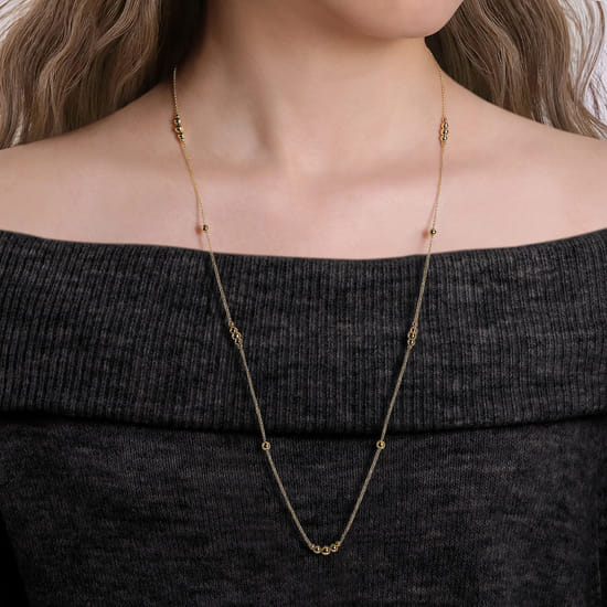 28 inch 14K Yellow Gold Graduating Bujukan Bead Station Necklace angle 3