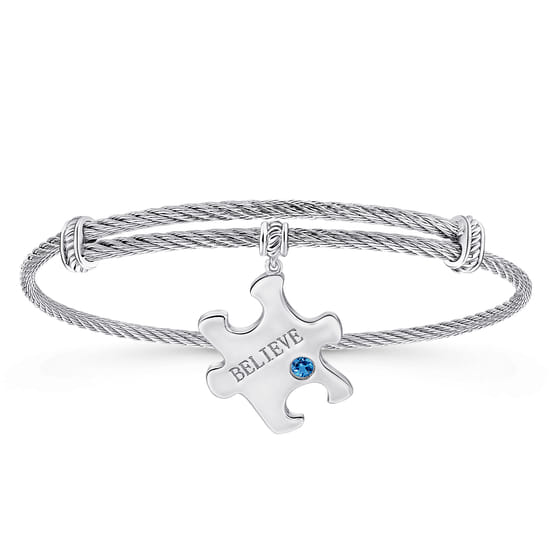 Adjustable Twisted Cable Stainless Steel Bangle with Sterling Silver Blue Topaz Puzzle Piece Charm Adjustable Twisted Cable Stainless Steel Bangle with Sterling Silver Blue Topaz Puzzle Piece Charm