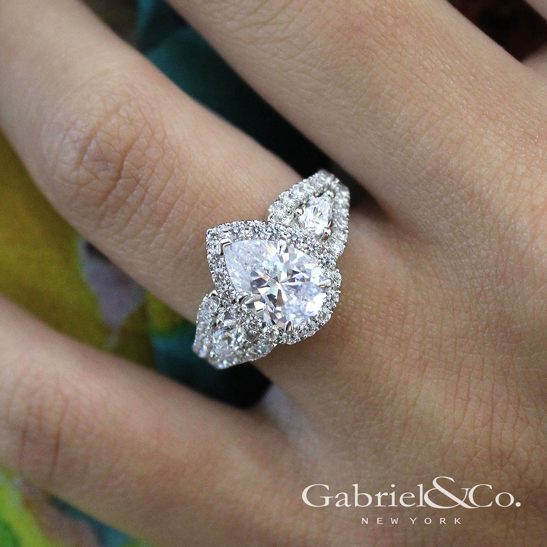 14K White Gold Pear Shape Three Stone Halo Diamond Engagement Ring angle 